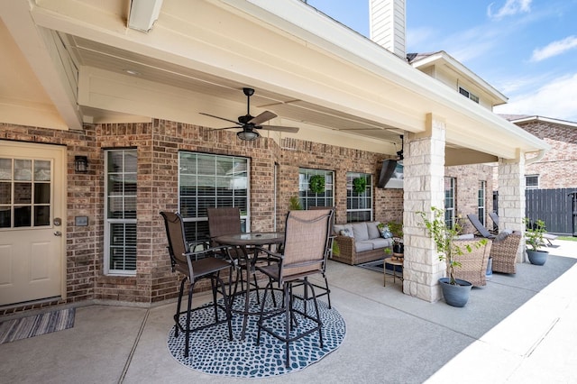 view of patio / terrace featuring ceiling fan