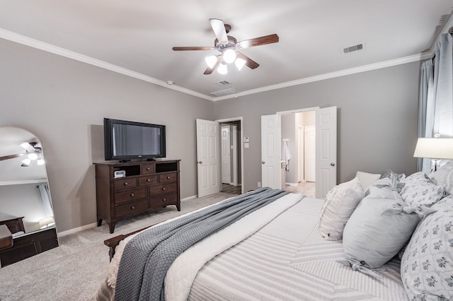 carpeted bedroom featuring ceiling fan and crown molding