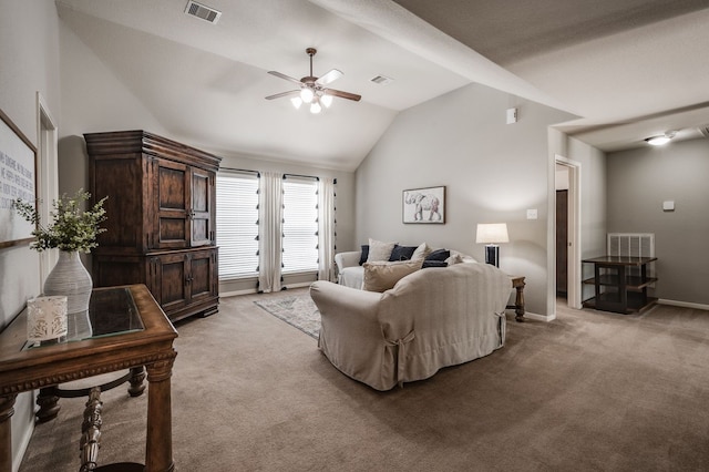 living room featuring lofted ceiling, ceiling fan, and light colored carpet