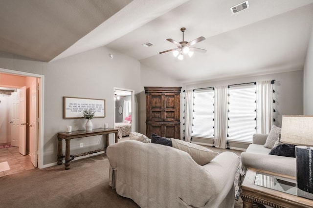 living room featuring lofted ceiling, carpet floors, and ceiling fan