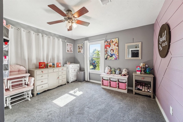 game room featuring carpet flooring and ceiling fan