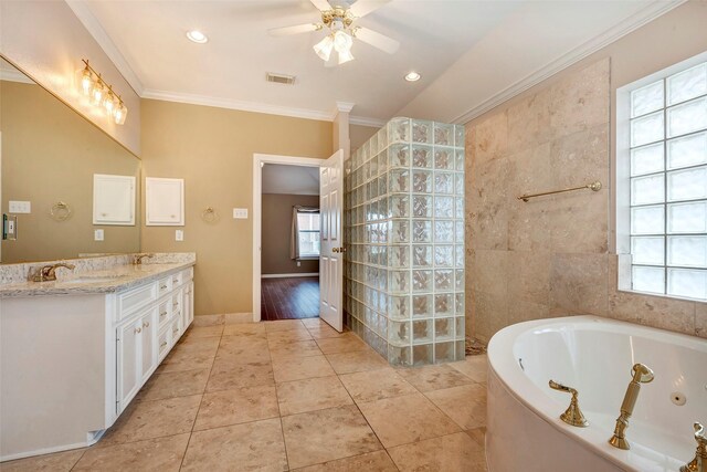 bathroom with ceiling fan, tile patterned floors, a washtub, vanity, and crown molding