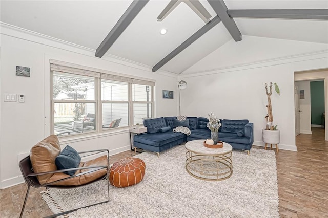 living room with vaulted ceiling with beams