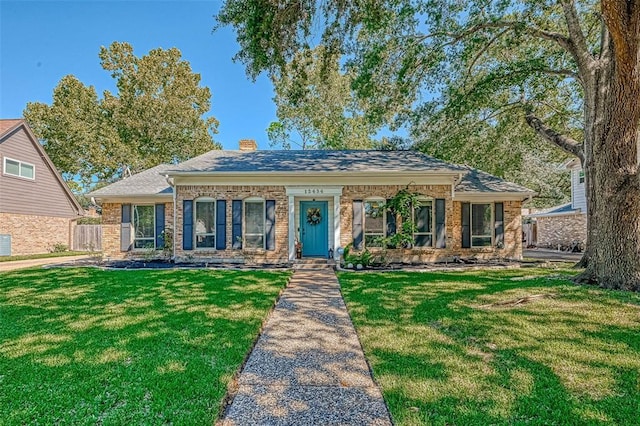 ranch-style house with a front yard