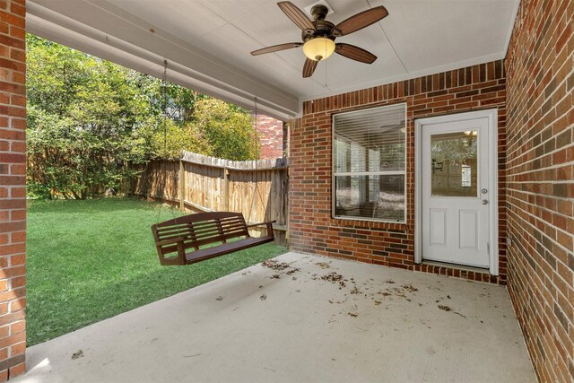 view of patio featuring ceiling fan