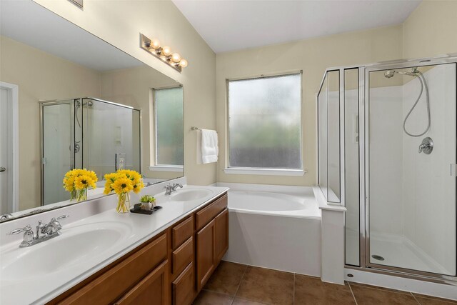 bathroom with vanity, independent shower and bath, and tile patterned flooring