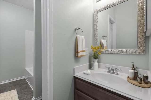 bathroom featuring a bathtub and vanity