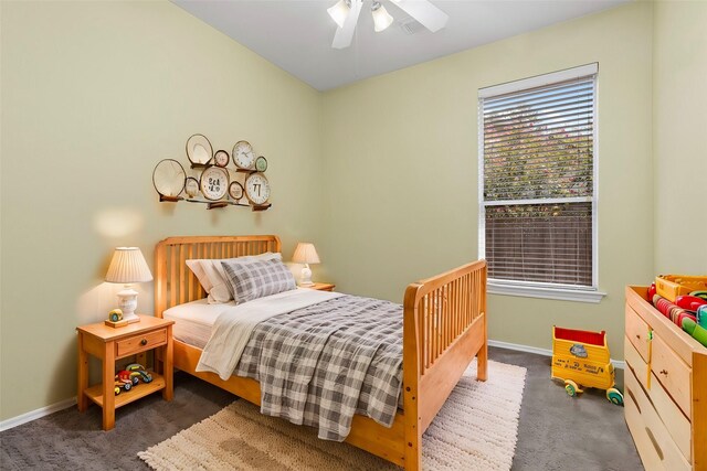 carpeted bedroom featuring ceiling fan