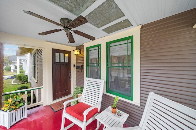 exterior space featuring ceiling fan