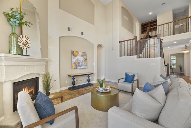 living room with a towering ceiling