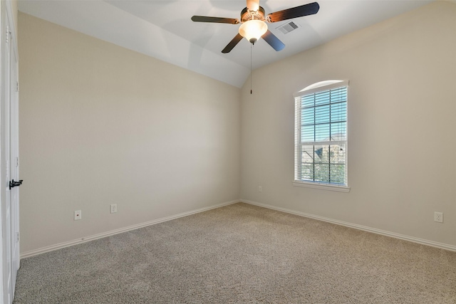 unfurnished room with lofted ceiling, carpet floors, and ceiling fan