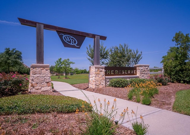 view of community sign