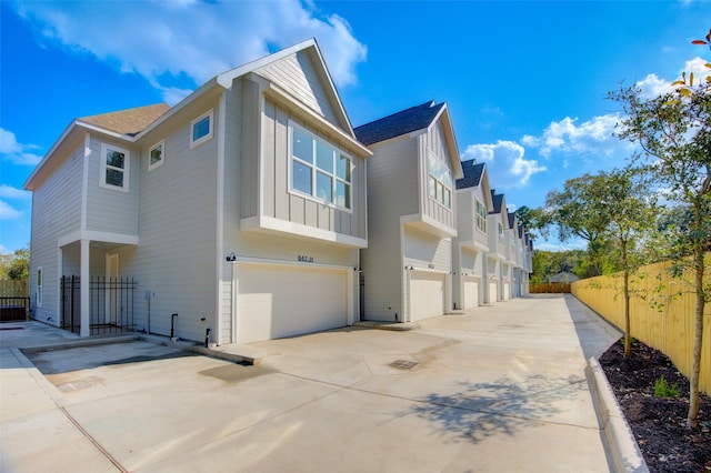 view of side of property featuring a garage