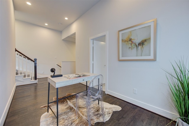 office area featuring dark wood-type flooring