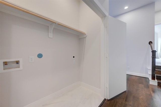 clothes washing area with dark hardwood / wood-style floors, hookup for a washing machine, and hookup for an electric dryer