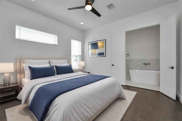 bedroom with dark hardwood / wood-style flooring and ceiling fan