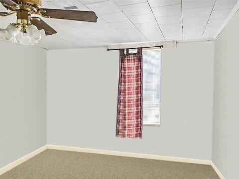 unfurnished room with ceiling fan and carpet flooring