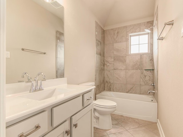 full bathroom with vanity, tile patterned floors, tiled shower / bath combo, and toilet