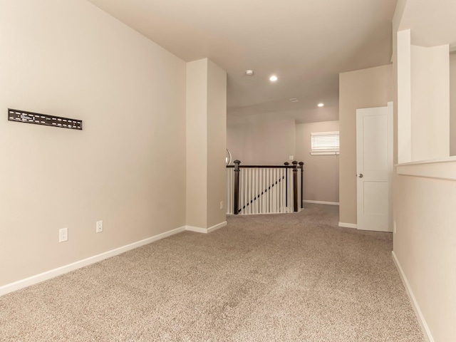 spare room featuring carpet flooring