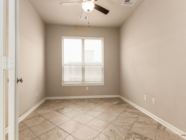 unfurnished room with ceiling fan