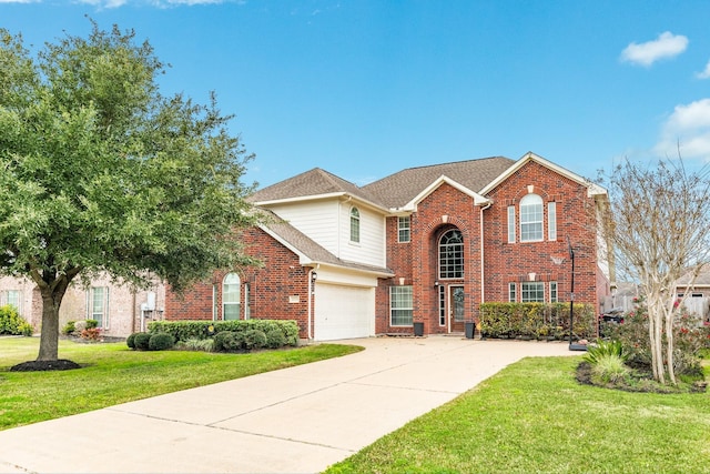 front of property featuring a garage and a front lawn