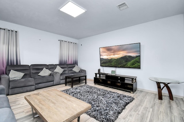 living room featuring wood-type flooring