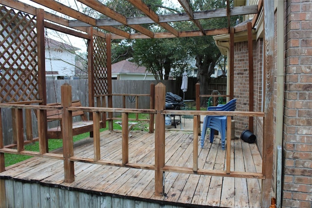 wooden deck with a pergola