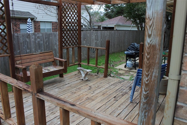 wooden deck with grilling area