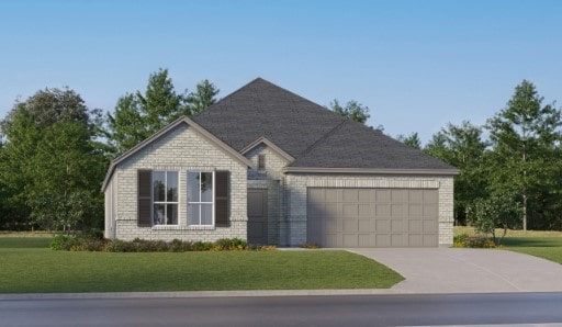 view of front facade with a front lawn and a garage