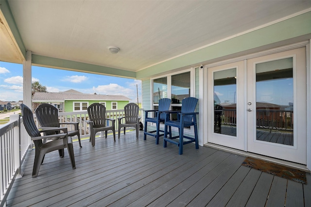 wooden terrace featuring french doors