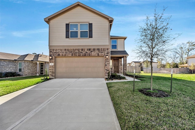 view of front of property featuring a garage and a front lawn