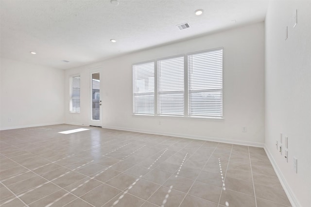 view of tiled empty room