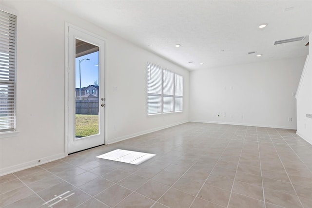 view of tiled spare room