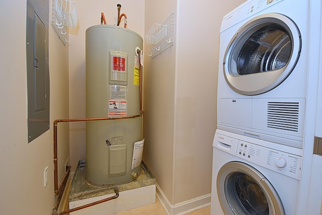 washroom with stacked washing maching and dryer, electric panel, and water heater