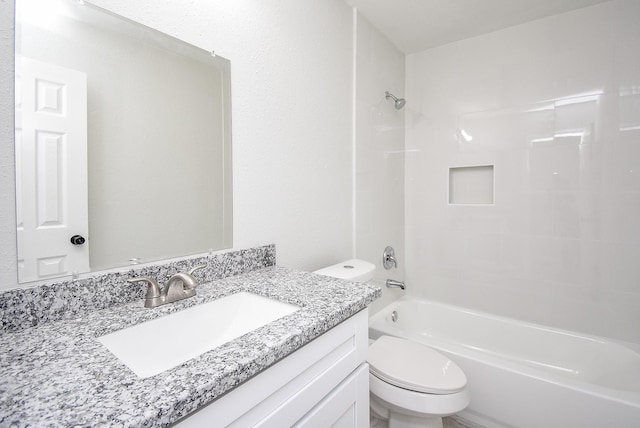 full bathroom featuring toilet, bathtub / shower combination, and vanity