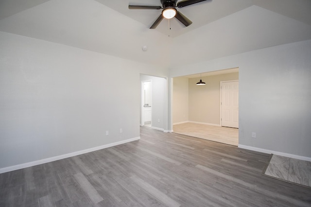 spare room featuring ceiling fan and hardwood / wood-style floors