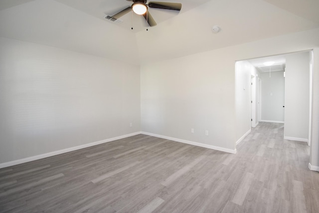 unfurnished room with ceiling fan and light wood-type flooring