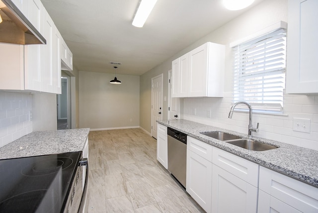 kitchen featuring white cabinets, stainless steel dishwasher, pendant lighting, and sink