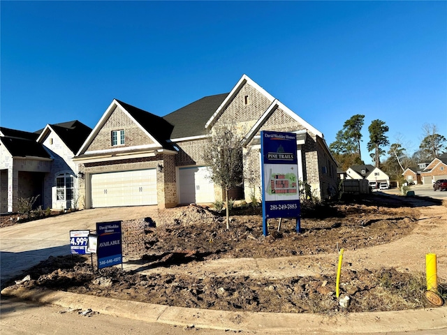 view of front of property featuring a garage