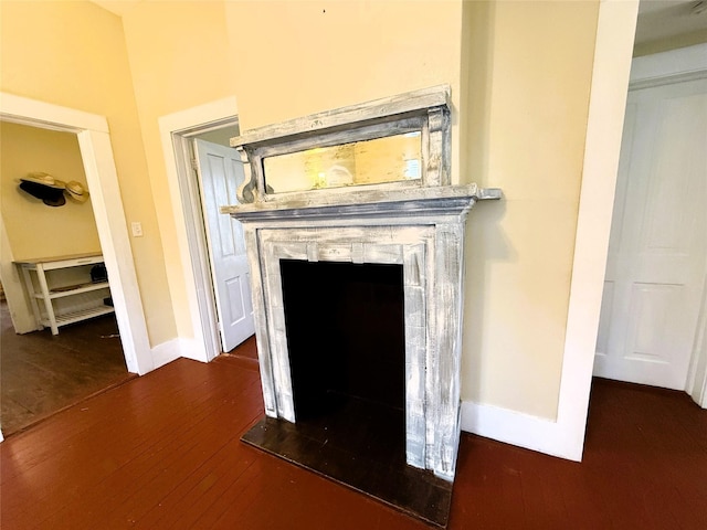 interior details featuring hardwood / wood-style flooring