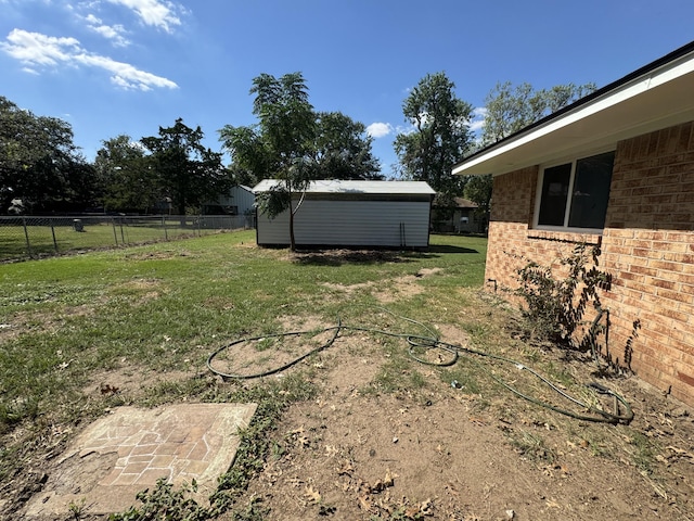 view of yard with a shed