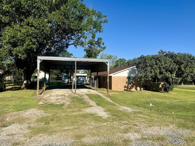 view of yard featuring a carport