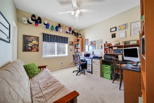 carpeted home office with ceiling fan