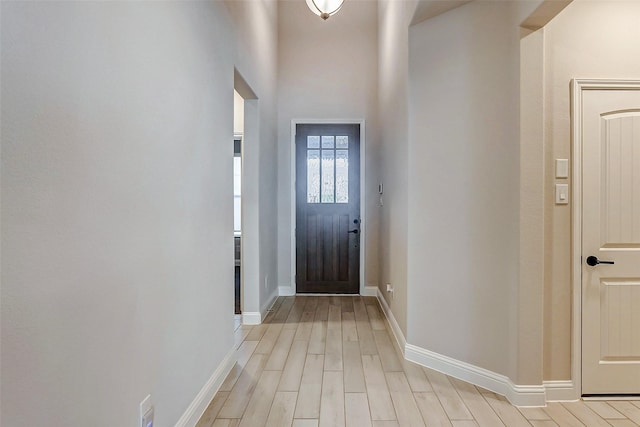 doorway to outside featuring light hardwood / wood-style flooring