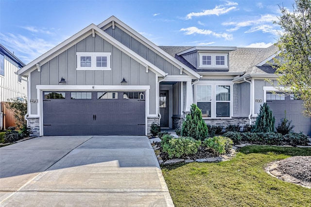 view of front of house with a front lawn and a garage