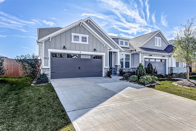 view of front of house featuring a front yard and a garage