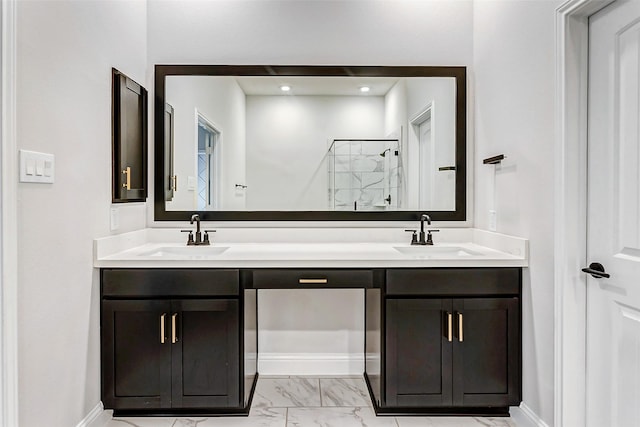 bathroom with a shower with door and vanity