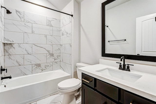 full bathroom with toilet, tiled shower / bath, and vanity