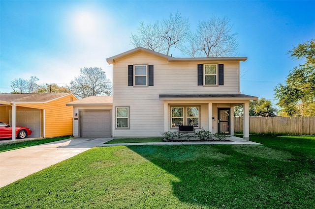 front of property with covered porch, a front lawn, and a garage