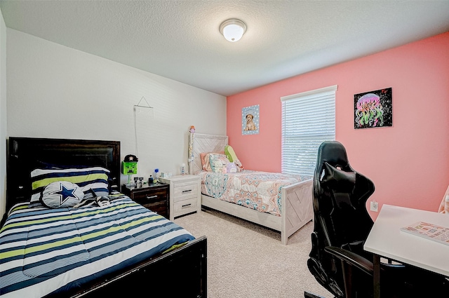 carpeted bedroom with a textured ceiling